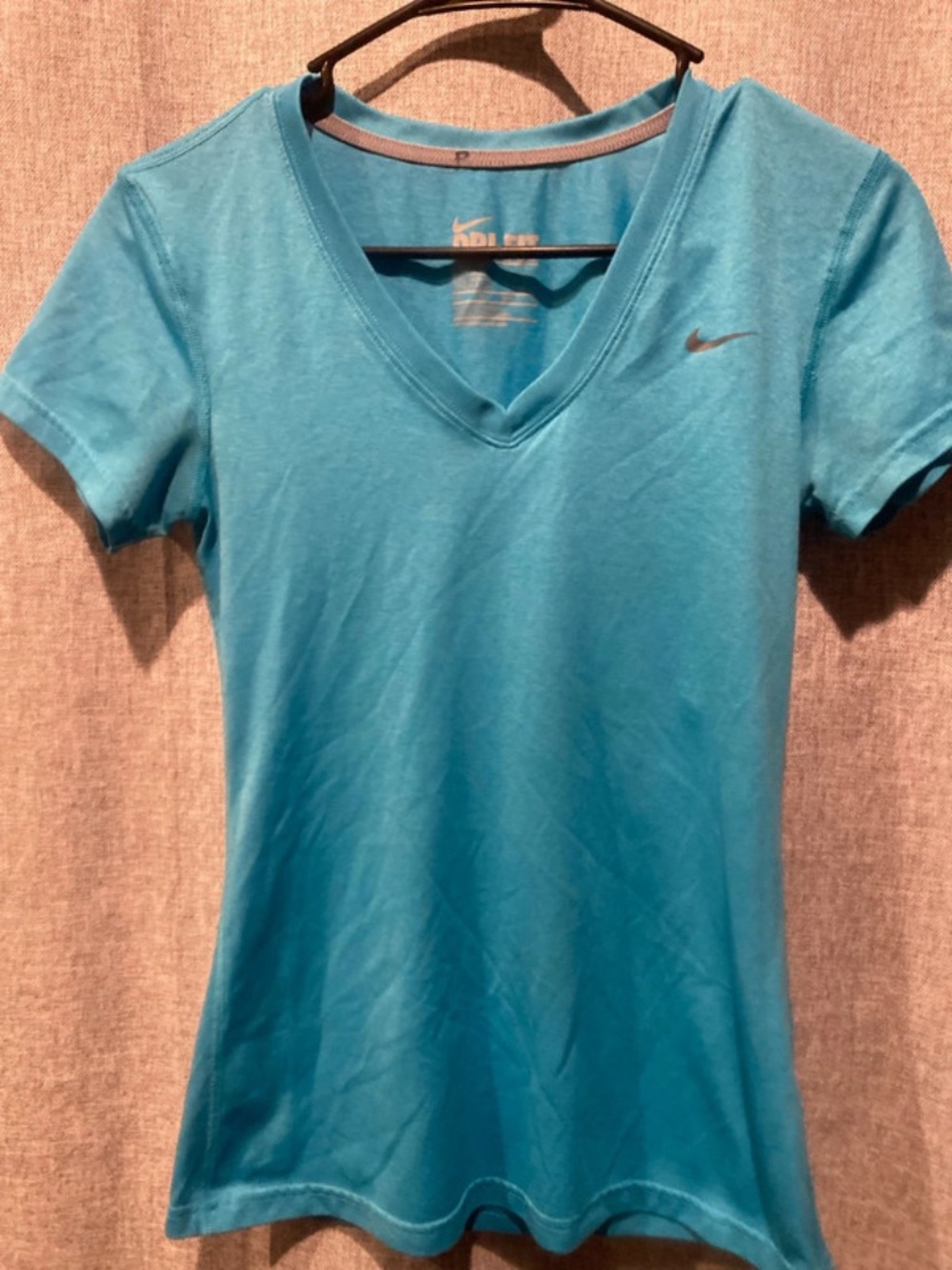 Nike Women’s Short-Sleeve V-Neck Tee in Teal Blue